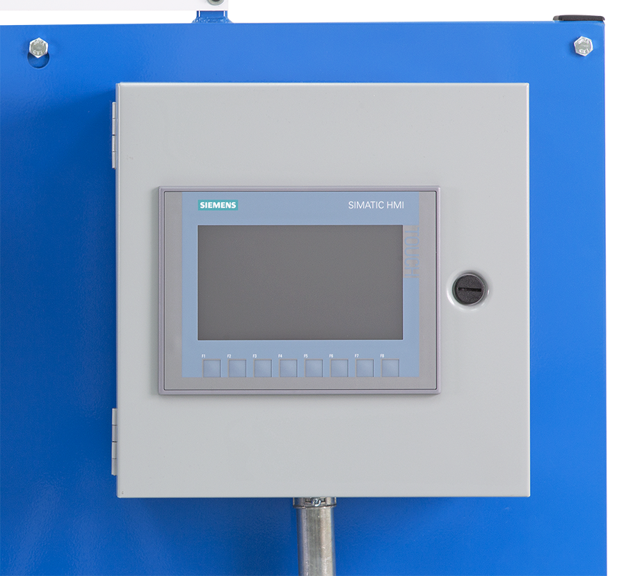 Siemens SIMATIC HMI touch panel mounted on a gray electrical enclosure inside a blue machine cabinet
