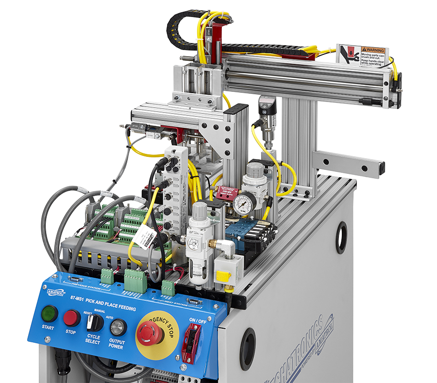 Automated feeder machine with blue control panel, pneumatic valves, hoses, and a horizontal linear actuator feeding parts.