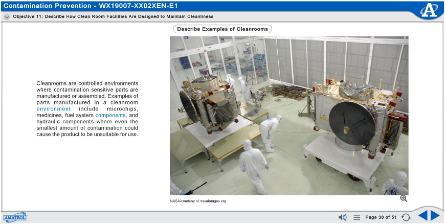 Cleanroom laboratory with technicians in white suits working around large scientific equipment on raised benches, maintaining a sterile environment.