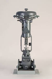 Industrial pressure regulator assembly with round diaphragm housing at the top, mounted on a vertical frame and base.