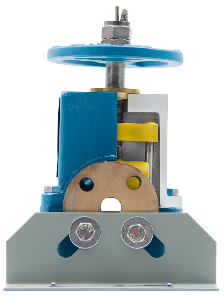 Small blue manual press with a large hand wheel on top and yellow gears inside the housing