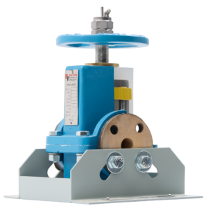 Blue manual actuator for a valve mounted on a metal base, with a round handwheel on top and a brass disc visible.