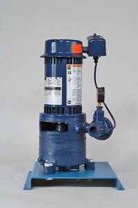 Blue industrial vertical pump motor mounted on a blue base, with wiring and a small control box attached.