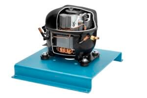 Air conditioning/refrigeration compressor mounted on a blue metal base plate.
