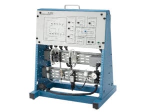 Industrial control-panel training simulator mounted on a blue frame with wiring and connectors visible.