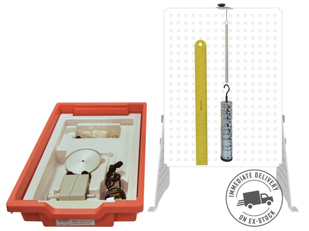 Open orange carrying case revealing a science kit; right side shows a pegboard with a yellow ruler and a hanging spring scale for measurements.