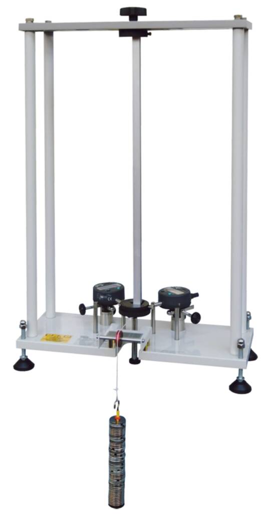 Vertical universal tensile testing machine with clamps and a hanging specimen for material strength tests