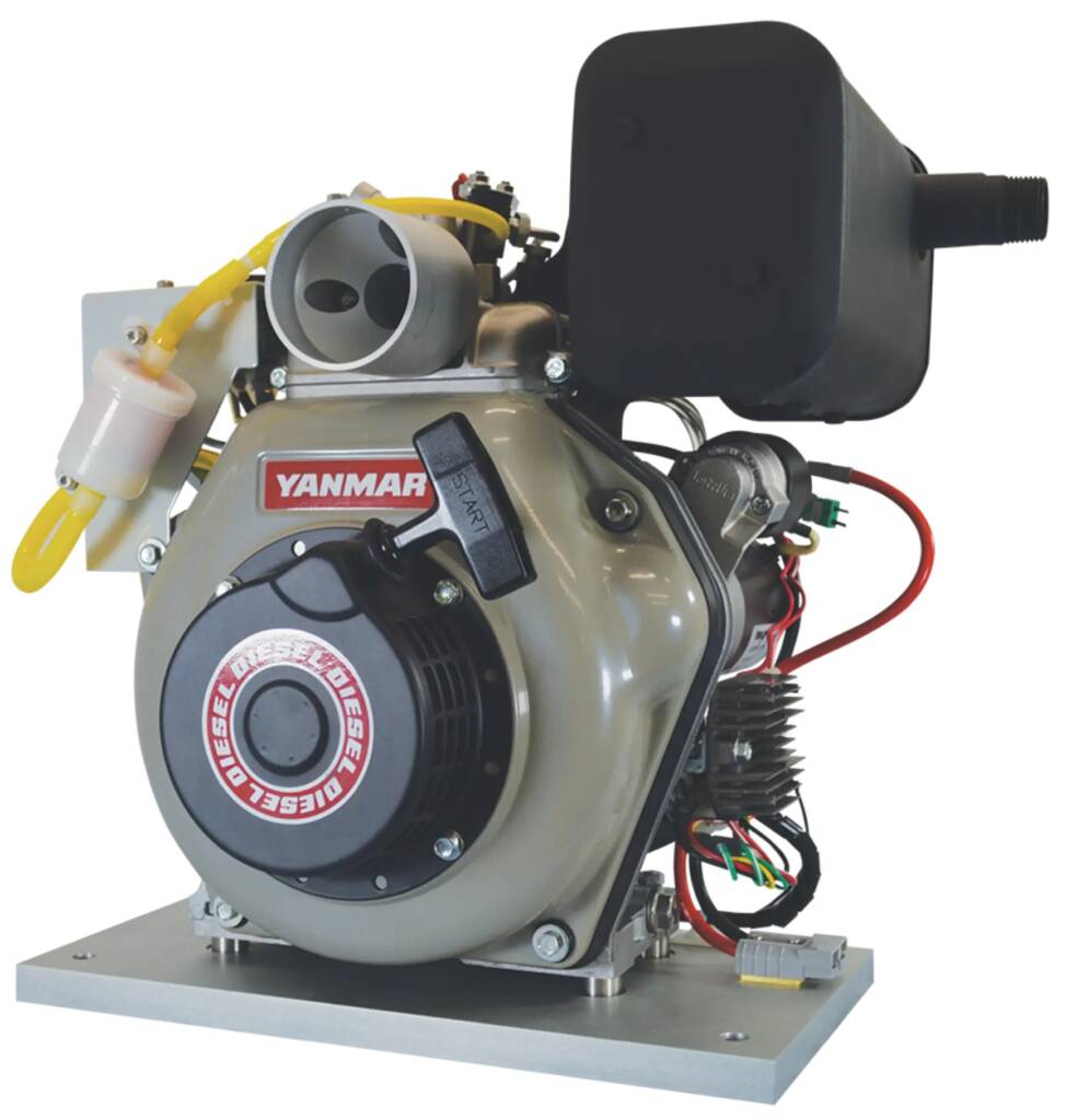 Close-up of a compact diesel engine mounted on a metal base, showing the air intake, yellow fuel line, and wiring with a black muffler housing nearby (Yanmar branding visible).