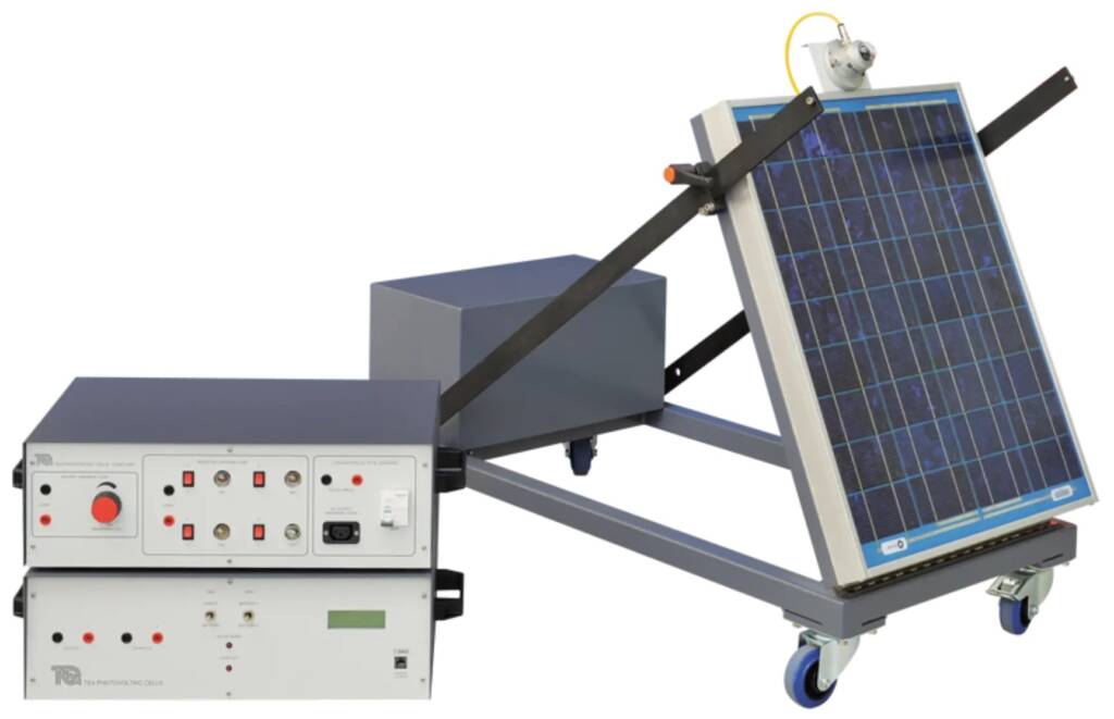 Mobile solar-tracking test rig: a tilted solar panel mounted on a wheeled frame connected to a control console with electrical panels.