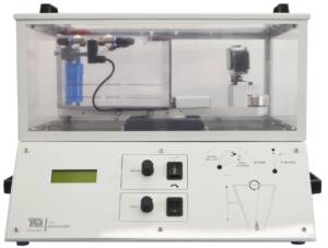 Laboratory instrument with a clear chamber and control panel featuring motors and switches