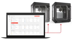 Laptop displaying a print management dashboard sending jobs to two 3D printers.