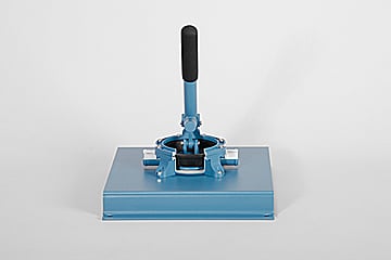 Blue manual press with a black handle on a flat base, used for stamping or punching.